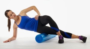 woman using foam roller